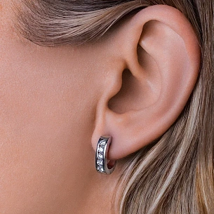 Серьги с английским замком из белого золота с бриллиантом