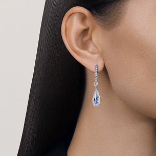 Серьги с английским замком из белого золота с топазом