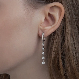 Серьги с английским замком из белого золота с бриллиантом