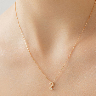 Подвеска из красного золота с бриллиантом